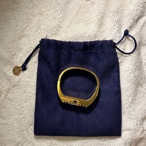 Tory Burch fit bit bracelet with dust bag. Worn twice, condition like new.